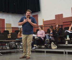 Vocal performance student sings challengingly high tenor notes in opera roles
