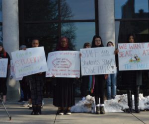 Students crowd outside faculty meeting to protest tuition increase