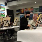 The Paint Mixer, a local art studio, leads participants through a wine and paint night called Fire Sun.